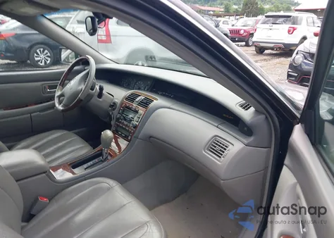 2003 Toyota Avalon Xls z USA, uszkodzony, nr VIN 4T1BF28B83U289548